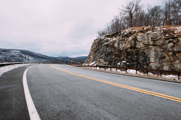 istock Road at Bear Mountain State Park in Winter - New York State 1129534895