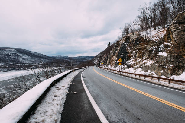 istock Road at Bear Mountain State Park in Winter - New York State 1129536608