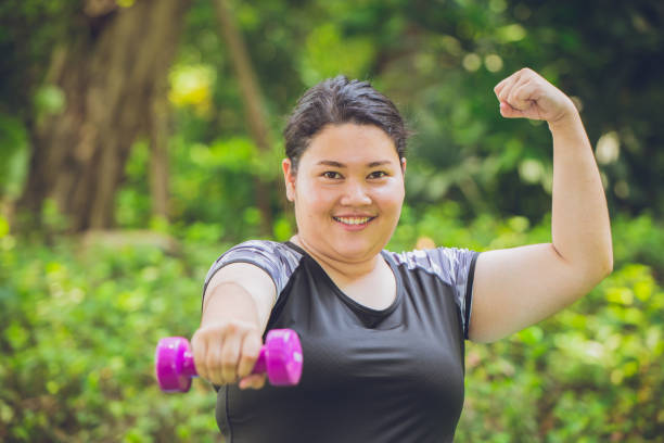 Strong and healthy overweight fat girl, outdoor sport activity teen concept. Strong and healthy overweight fat girl, outdoor sport activity teen concept. woman defeat stock pictures, royalty-free photos & images