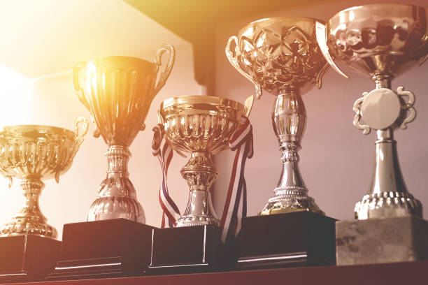 istock Group of Trophies on Shelf 1129552941
