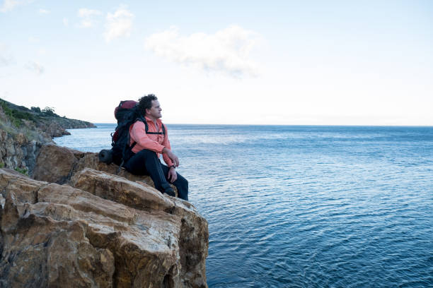 istock Hiking along a coastal hiking path 1129554037