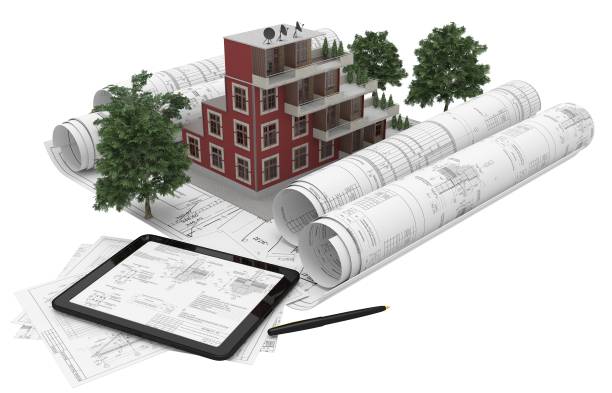 istock Rolls architectural drawings with the tablet computer and house model on a white background. Composition in 3D. 3D illustration. 1129562531