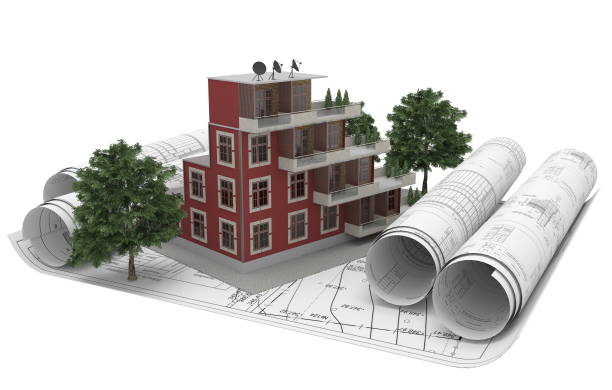 istock Rolls architectural drawings with the tablet computer and house model on a white background. Composition in 3D. 3D illustration. 1129562537