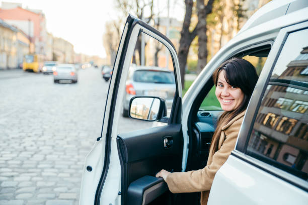 istock woman driver sitting in car 1129563883