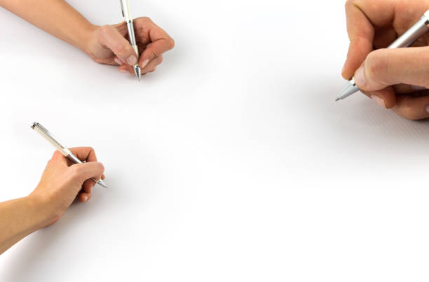 istock Hand holding pen, set isolated on white background 1129565157