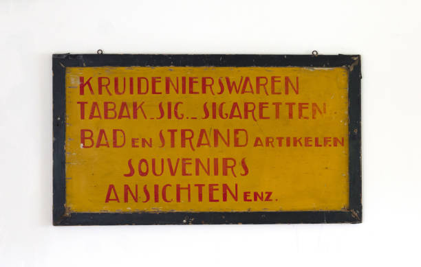 istock Sign saying 'groceries, tabaco, cigarettes, etc.' in dutch 1129566722