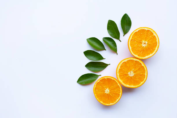 istock High vitamin C. Fresh orange citrus fruit with leaves isolated on white. 1129566794