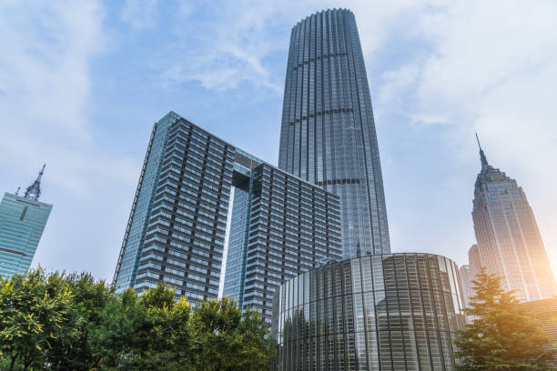 istock architectural complex against sky in downtown tianjin, china. 1129569987