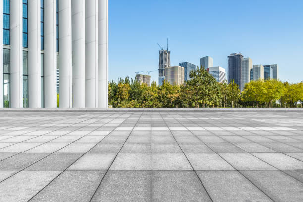 istock Abstract building wall with city skyline background 1129570117