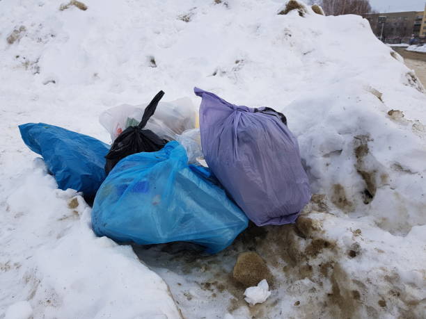 istock trash and garbage bags on snow 1129571729