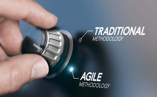 Man turning knob to changing project management methodology from traditional to agile PM. Composite image between a hand photography and a 3D background.