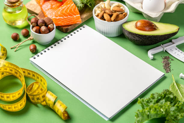istock Keto diet concept - salmon, avocado, eggs, nuts and seeds 1129572575