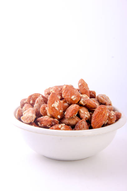istock dry almond in bowl 1129572594