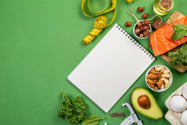 istock Keto diet concept - salmon, avocado, eggs, nuts and seeds 1129572607