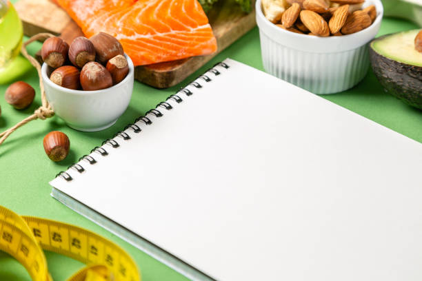 istock Keto diet concept - salmon, avocado, eggs, nuts and seeds 1129572633