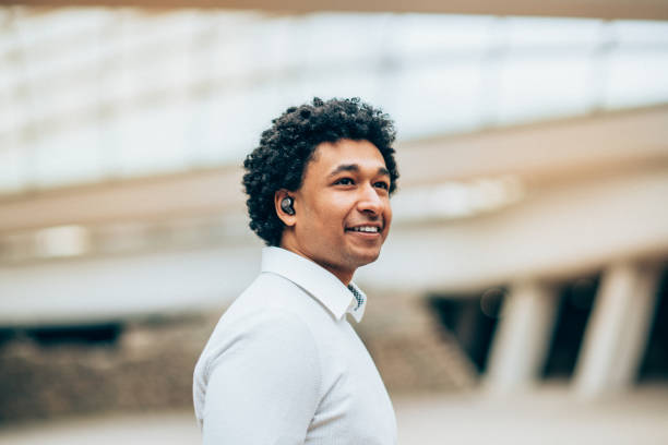 istock Portrait of modern man with Wireless earbuds 1129572763