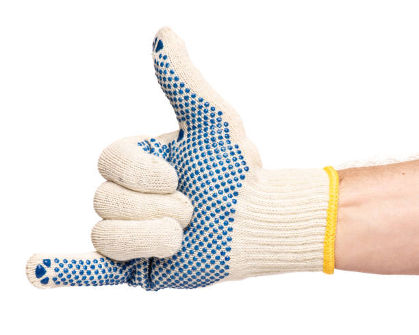 istock Male hand wearing working glove 1129572915