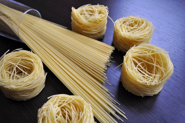 istock food - pasta set with glasses 1129572917