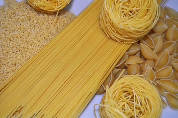 istock food - pasta set with glasses 1129573570