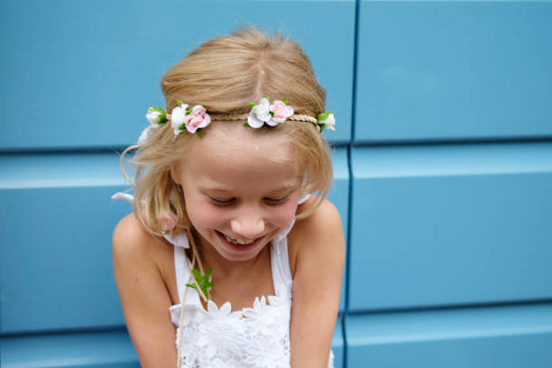 istock Little girl laughing 1129579395