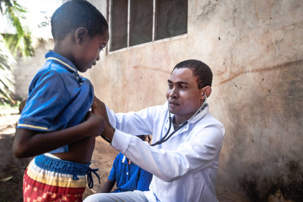 istock Doctor meet African child 1129580589