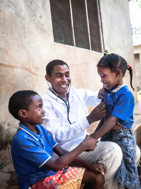 istock Doctor meet African child 1129580625