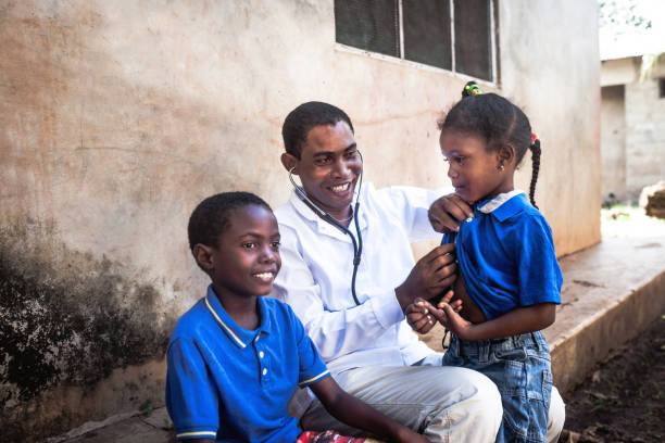 istock Doctor meet African child 1129580691