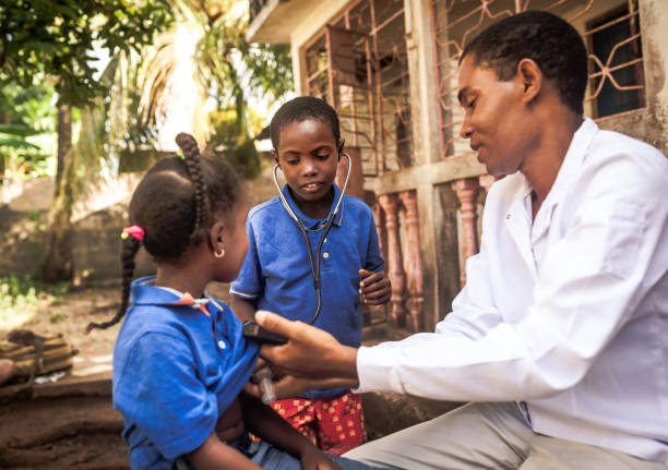 istock Doctor meet African child 1129580723