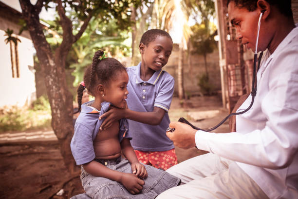 istock Doctor meet African child 1129580763