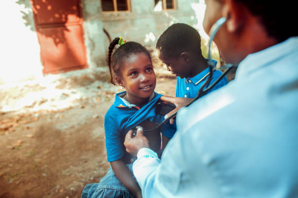 istock Doctor meet African child 1129580802