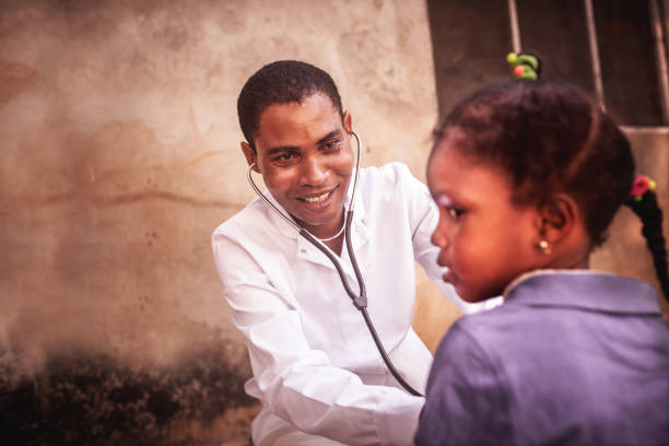 istock Doctor meet African child 1129582381