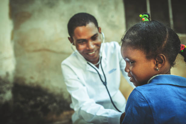 istock Doctor meet African child 1129582394