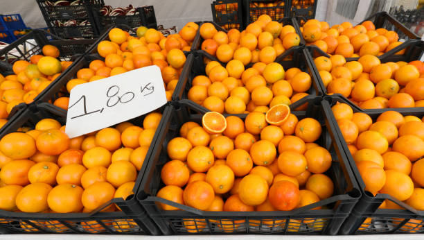 istock boxes full of ripe oranges for sale 1129584862