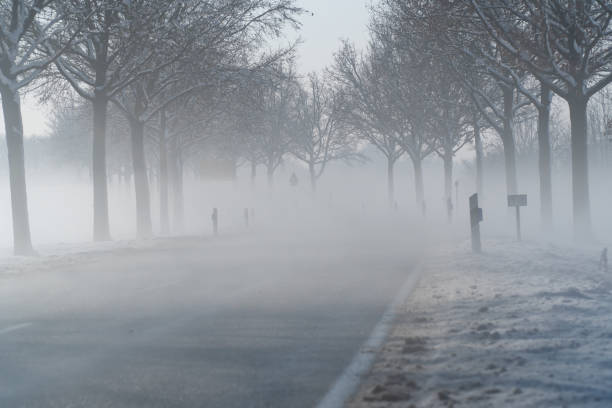 istock Highway on a foggy winter morning 1129586564
