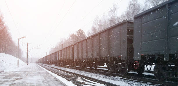 istock train on snowy railway track 1129589389