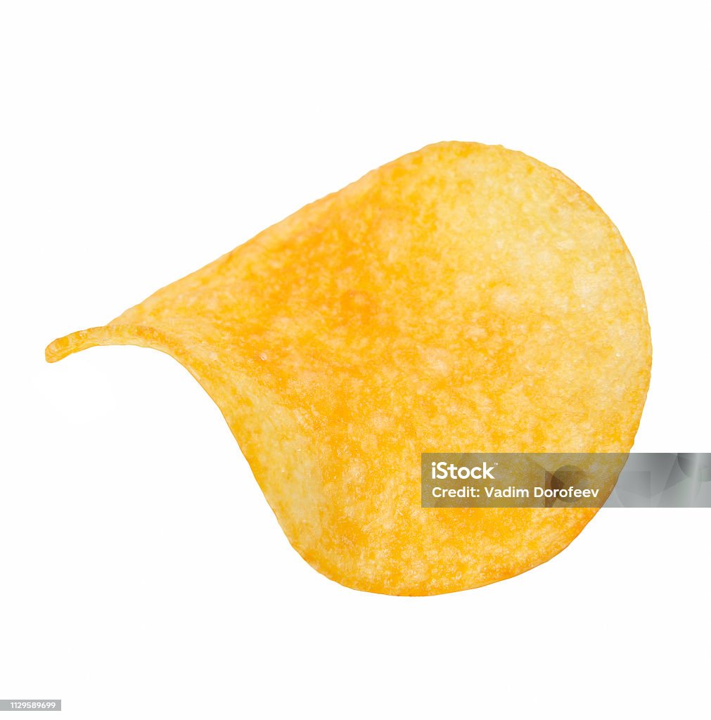 Crisp slice of chips close-up. White background. Crisp slice of chips close-up. White isolated background. Carcinogen Stock Photo