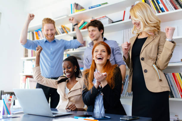 istock Succesful company celebrates business success 1129591739