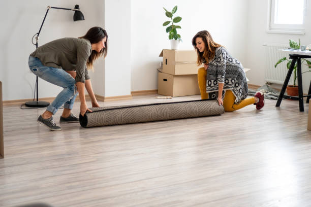 istock Lesbian couple moving into a new apartment 1129593153