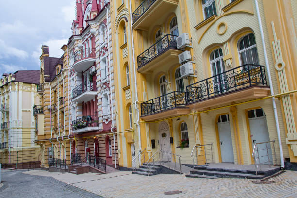 istock Facade of beautiful houses in classical style. Architecture 1129595484