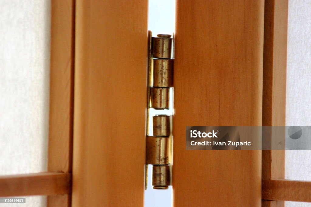 Hinges in the Paravant Connection of two frames with metal hinges Apartment Stock Photo