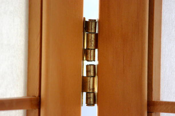 Hinges in the Paravant Connection of two frames with metal hinges türklinke stock pictures, royalty-free photos & images