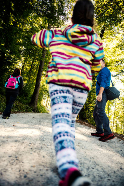 istock Family enjoying a hike in the mountains 1129599624
