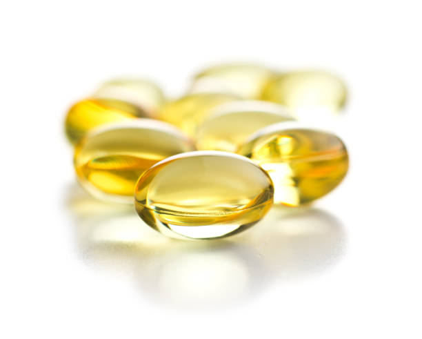 Omega 3 gel capsules. Omega 3 gel capsules. Fish oil pills. Healthy omega-3. animal internal organ photos stock pictures, royalty-free photos & images