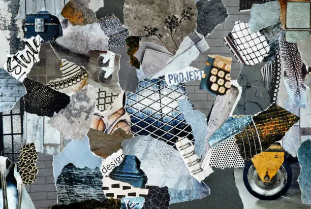 Photo of Industrial Collage mood bord in grey blue colors made of teared recycling waste paper of magazines and printed matter results in modern art background