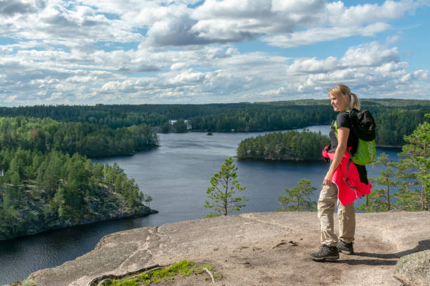 istock Woman hiking in forest 1129603979