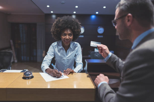 istock Businessman checking in at the hotel 1129605928