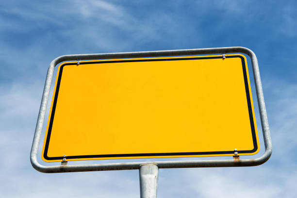 istock Blank yellow city sign in Germany 1129607063