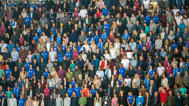 istock Spectators watching football match 1129607846