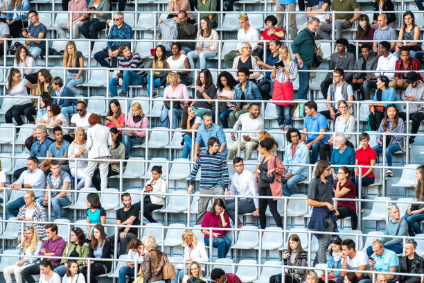 istock Group of spectators at stadium 1129607864