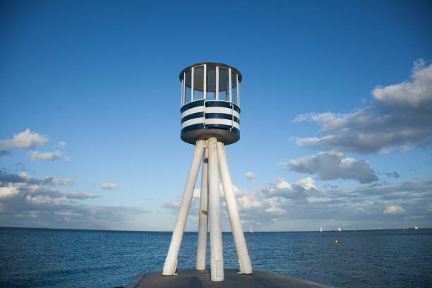 Bellevue Beach - on the northern outskirts of Copenhagen.  Lifeguard towers stock photo
